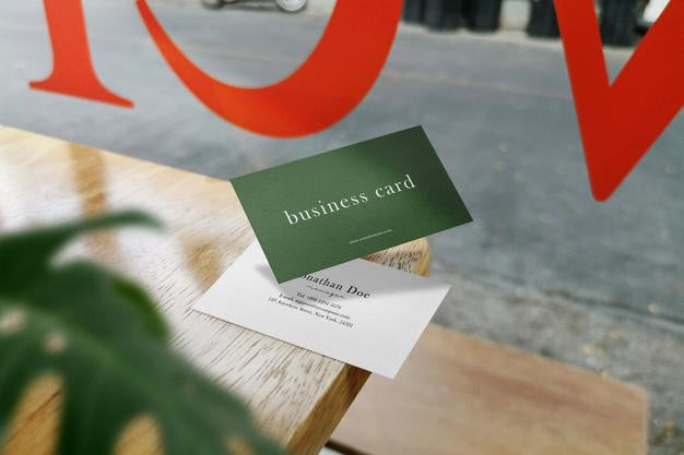 Clean Minimal Business Card Mockup Floating On Top Wood In Cafe And Leaves Background. Psd File. Psd
