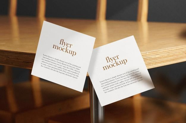 Clean Minimal Square Flyer Mockup Floating On Table Side With Leaves. Psd File. Psd