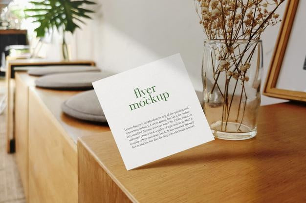 Clean Minimal Square Flyer Mockup Floating On Wooden Top With Glass Vase. Psd File. Psd