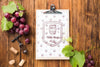 Clipboard With Organic Grape On Table Psd