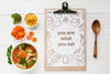 Clipboard With Organic Vegetables Beside Psd