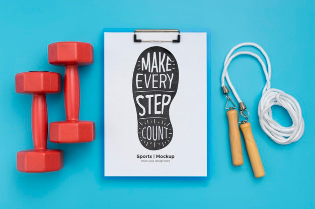 Clipboard With Weights Beside And Jumping Rope Psd