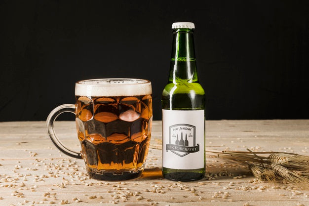 Close-Up Beer Bottle On Wooden Table Psd