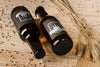 Close-Up Beer Bottles On Wooden Table Psd