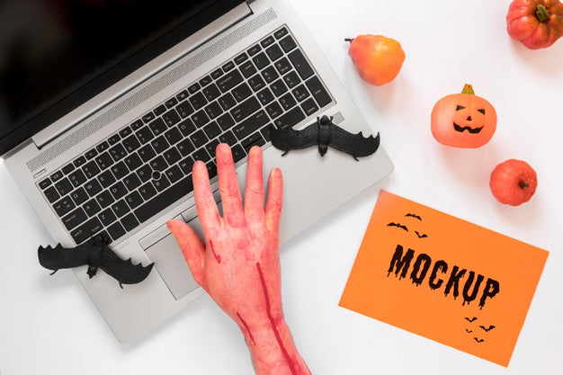 Close-Up Bloody Hand Touching Laptop Psd