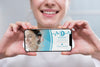 Close-Up Dentist Holding A Smartphone Mock-Up Psd