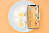 Close-Up Eggs With Phone Mock Up Psd