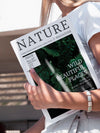 Close-Up Hand Holding A Nature Magazine Mock Up Psd