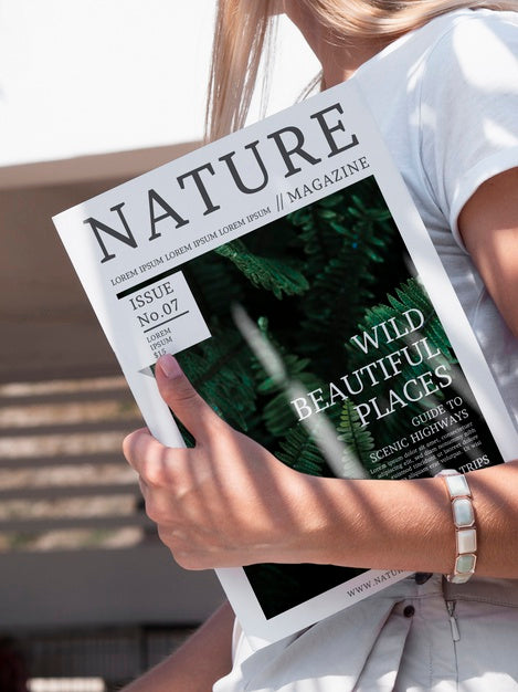 Close-Up Hand Holding A Nature Magazine Mock Up Psd