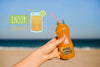 Close Up Hand Holding Beverage Bottle With Copy Space Psd