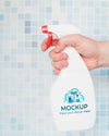 Close-Up Hand Holding Cleaning Product Bottle Psd