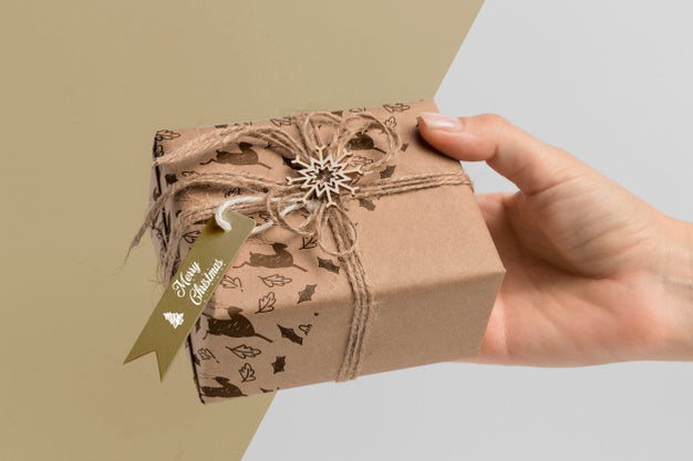 Close-Up Hand Holding Gift Psd