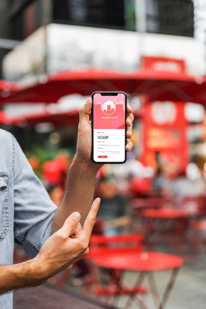 Close-Up Hand Pointing At Smartphone Psd