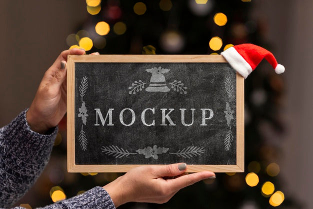 Close-Up Hands Holding Blackboard Psd