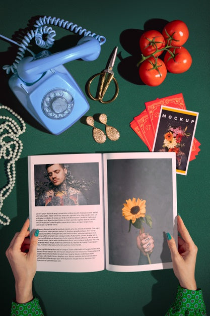 Close-Up Hands Holding Open Magazine Psd