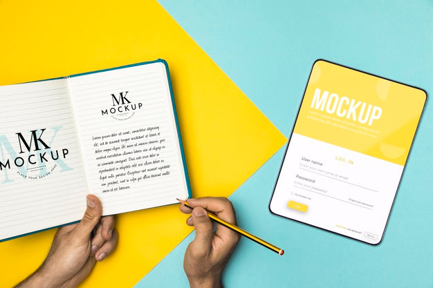 Close-Up Hands Holding Pencil And Notebook Psd