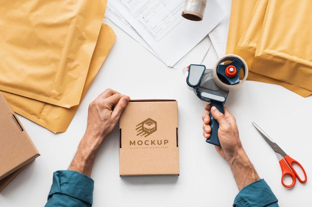 Close Up Hands Preparing Box For Delivery Psd