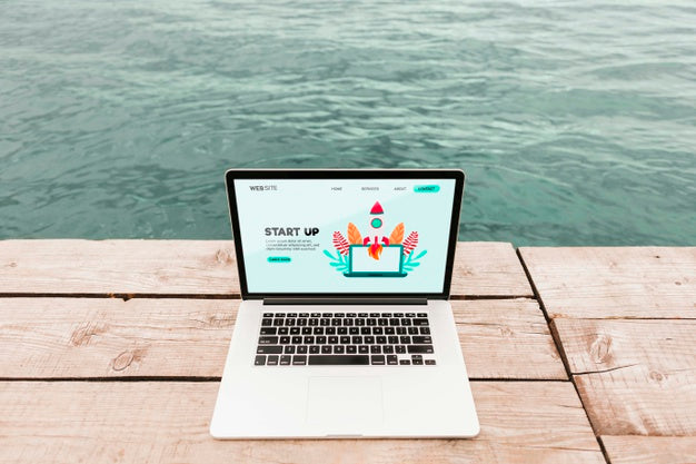 Close-Up Laptop With Start Up Landing Page Psd