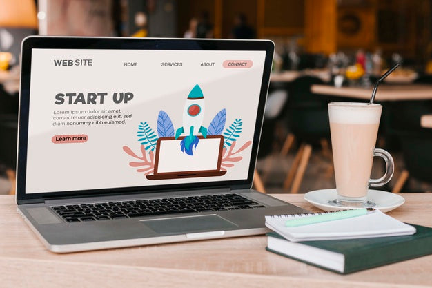 Close-Up Laptop With Start Up Landing Page Psd