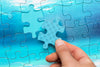 Close-Up Man Holding A Piece Of Puzzle Psd