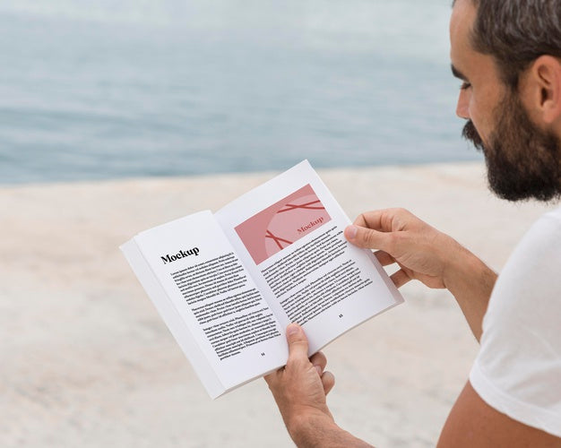 Close Up Man On Street Reading Book Psd