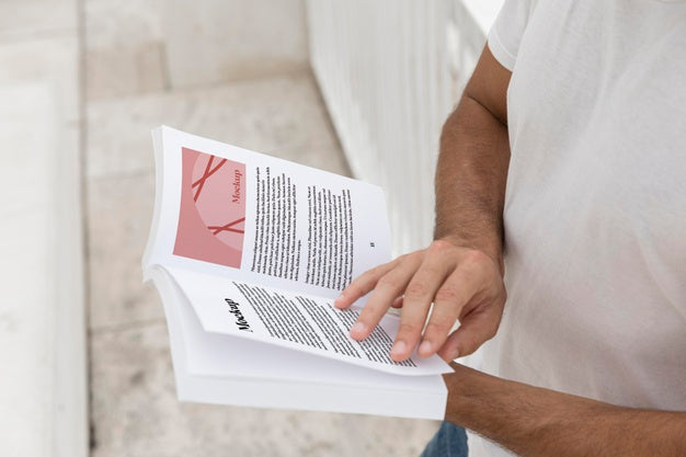Close Up Man On Street Reading Book Psd