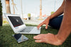 Close-Up Man Outdoor With Laptop And Mobile Psd