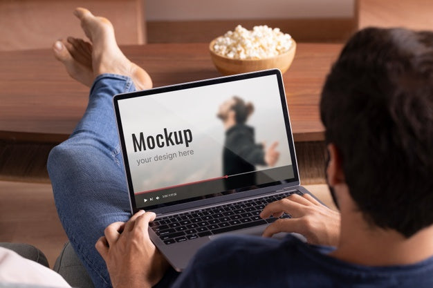 Close Up Man Watching Movie On Laptop Psd