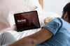 Close Up Man Watching Movie On Tablet Psd