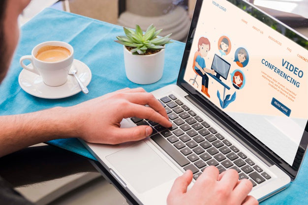 Close-Up Man Working On Laptop Psd