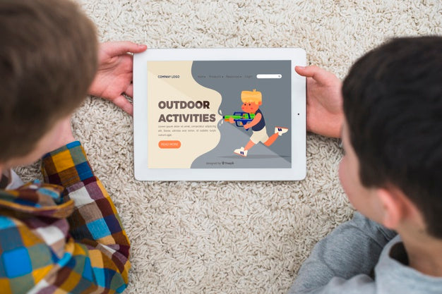 Close-Up Nice Kids With Tablet Indoors Psd