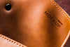 Close-Up Of Brown Leather With Button Psd