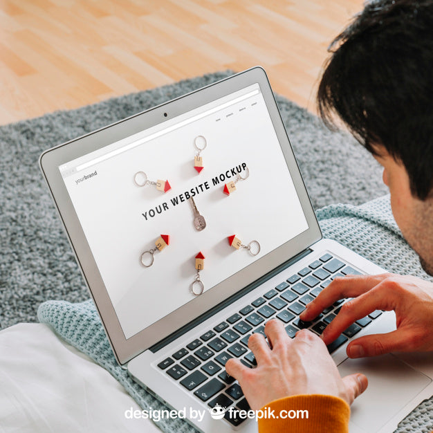 Close Up Of Man Using Laptop Psd