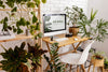 Close Up On Computer Mockup Surrounded By Plants Psd