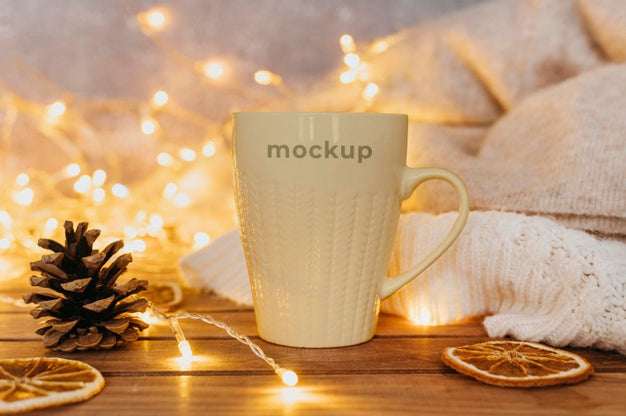 Close Up On Cup Mockup Design Near Festive Lights Psd