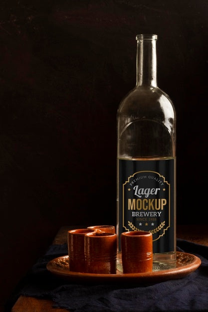 Close Up On Mezcal Drink Bottle With Glasses Psd