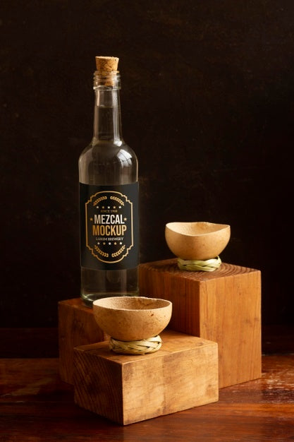 Close Up On Mezcal Drink Bottle With Glasses Psd