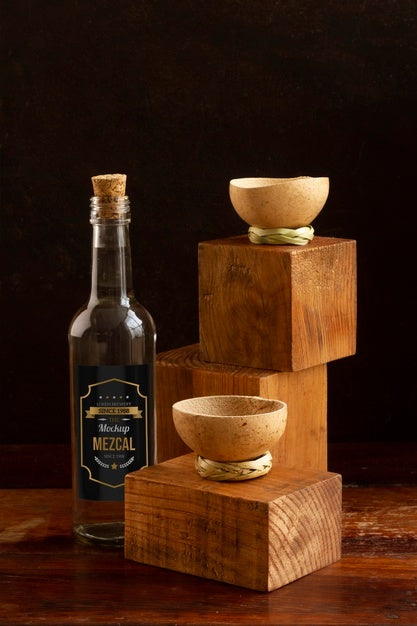 Close Up On Mezcal Drink Bottle With Glasses Psd