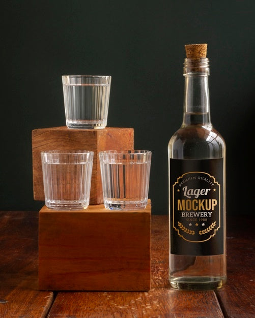 Close Up On Mezcal Drink Bottle With Glasses Psd