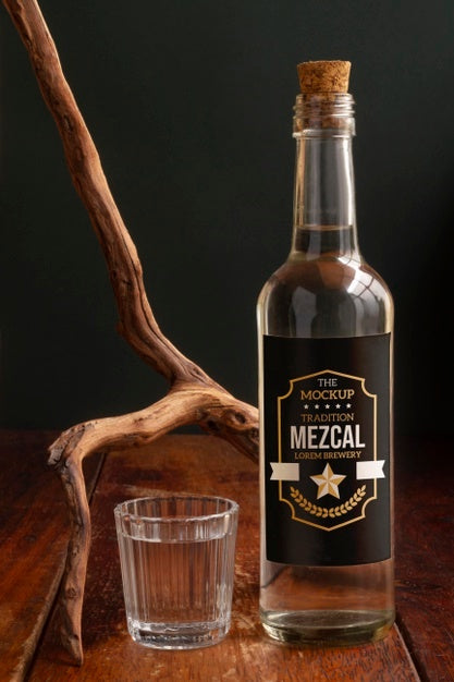 Close Up On Mezcal Drink Bottle With Glasses Psd