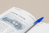 Close-Up Open Book Mock-Up With Pen Psd