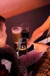 Close-Up People With Smartphone And Beer Psd
