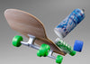 Close-Up Skateboard Next To Spray Cans Psd