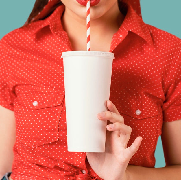 Close Up Woman Drinking With Straw Psd