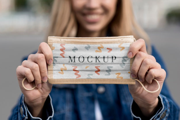 Close-Up Woman Holding Mask Psd