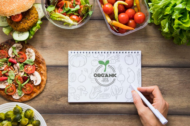 Close-Up Woman With Notebook Holding Pen Psd