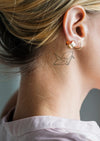 Closeup Of A Simple Behind The Ear Tattoo Of A Young Woman Psd