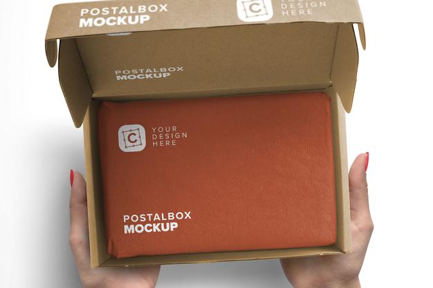 Closeup Package Mockup With Woman Hands Holding Opened Postal Box Psd