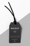 Clothing Black Size Tag Mock-Up With Black Thread Psd