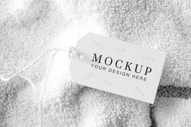Clothing Mock-Up Tag With Thread On Towel Psd
